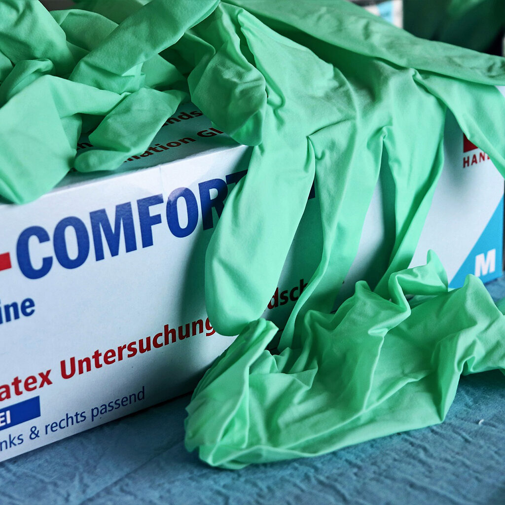 Medizinische Untersuchungshandschuhe aus Latex, türkis